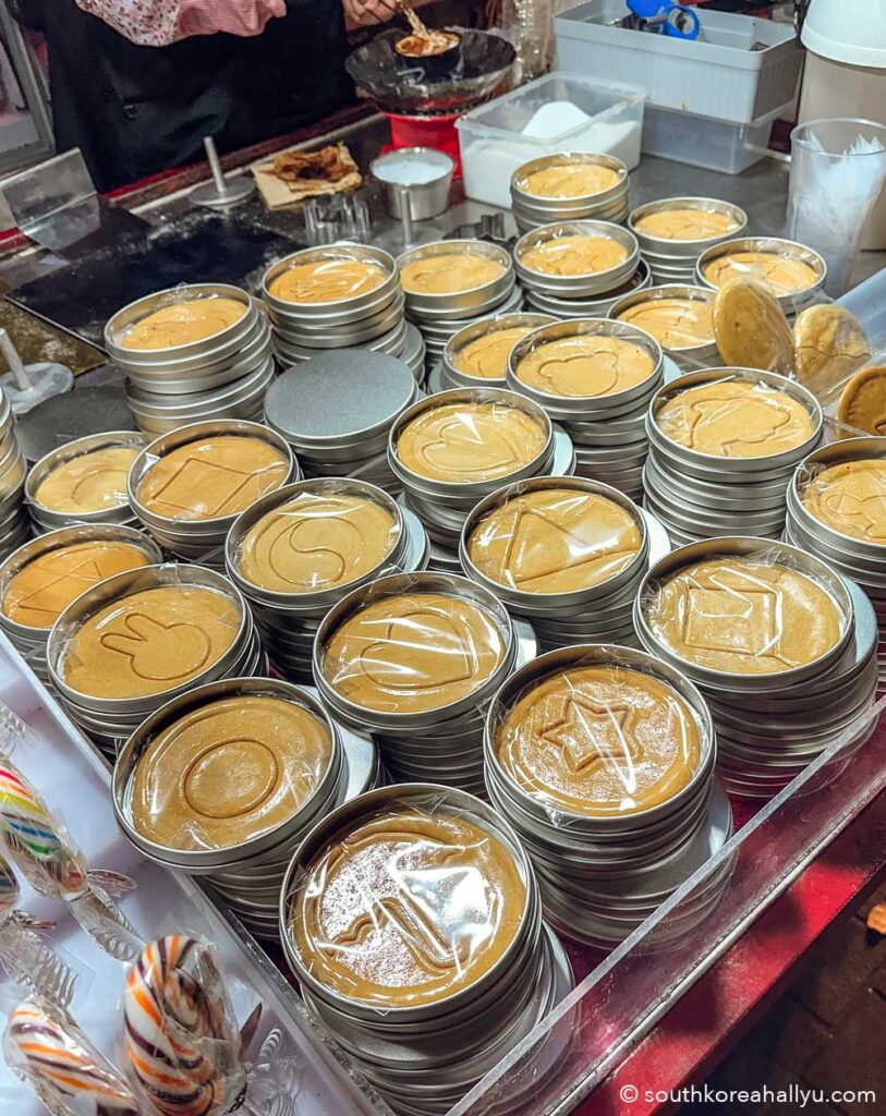 Squid Game dalgona at a night market in Seoul South Korea